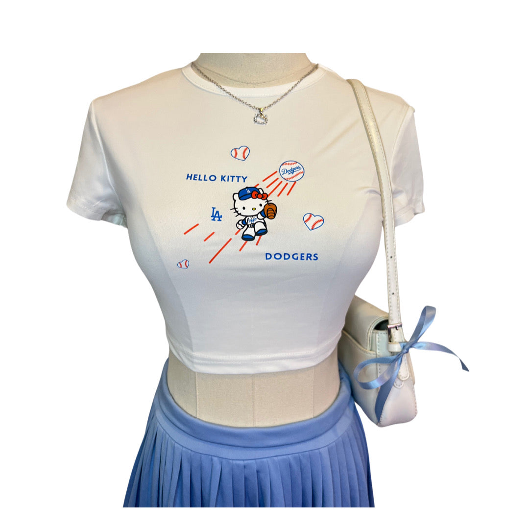 Hello Kitty throws a pitch - cropped white tee